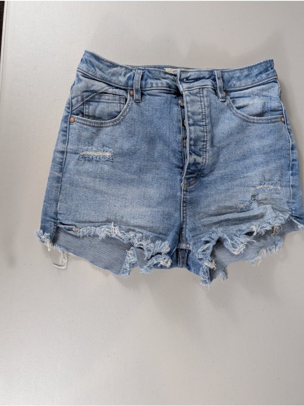 Free people we the free shorts in light blue women's size 28